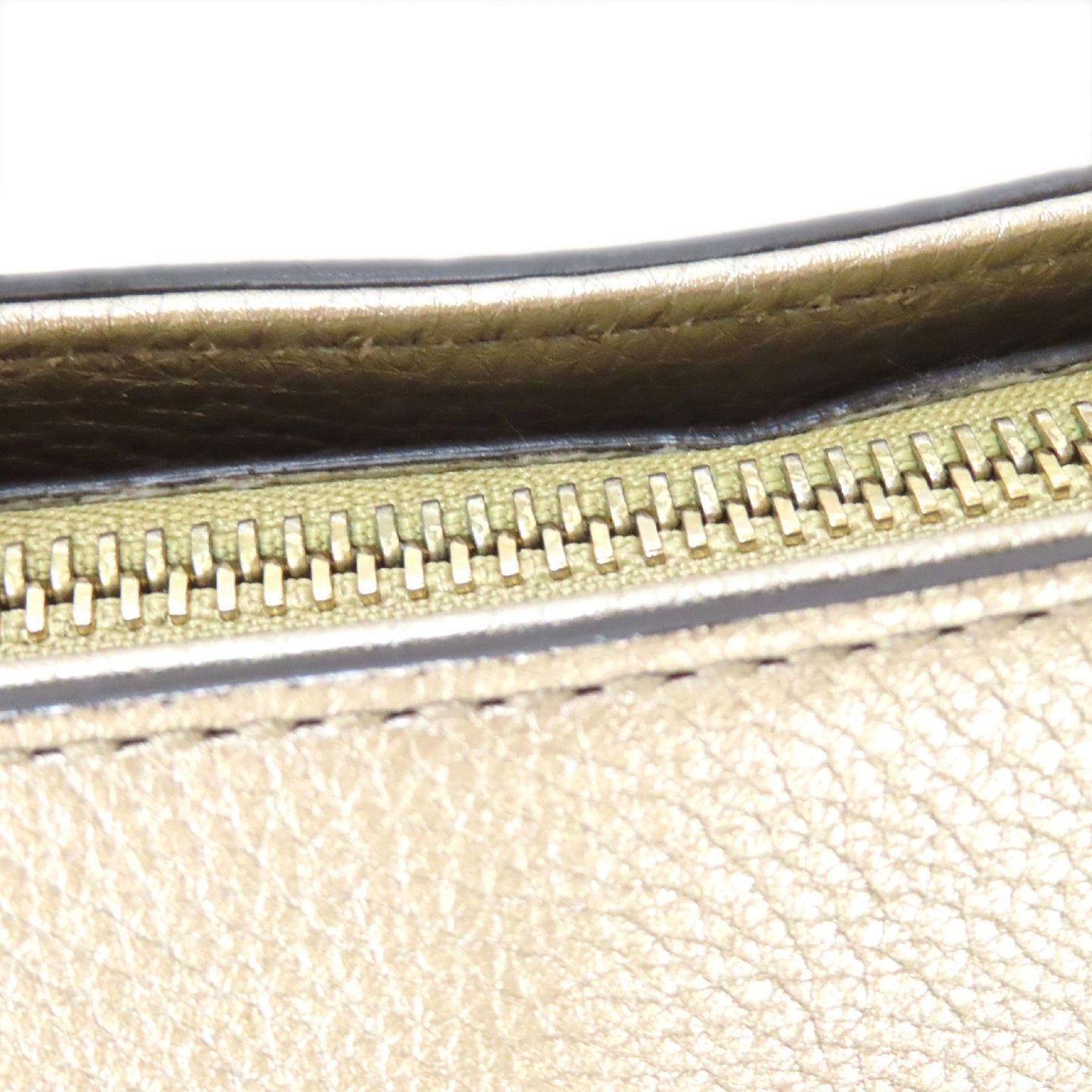 Gucci Pebbled Calfskin Soho Small Top Handle Bag